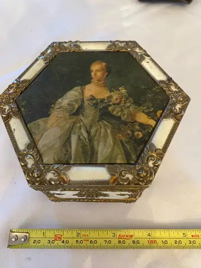 This antique enamel metal trinket/ jewelry box is a unique find, perfect for storing your precious i...