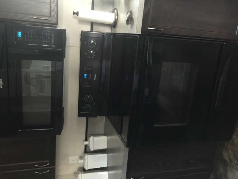 Whirlpool stove and over the range microwave with exhaust fan. Stoves, Ovens & Ranges