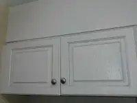 A few kitchen & bathroom cabinet doors  & hinges & knobs & shelf