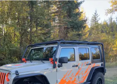 Full Metal Roof Rack from a 2018 Jeep Wrangler 4-Door. This rack has been used, but is still in good...