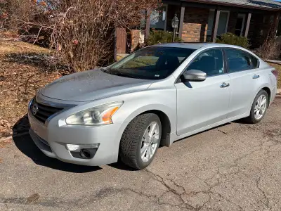 Summer and Winter tires included, clean non smoking car.