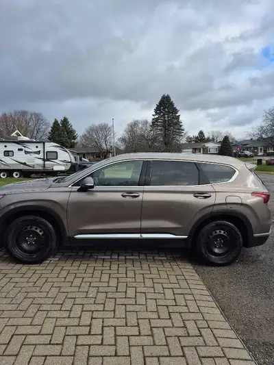 AWD, heated seats and steering wheel Trailer hitch, floor protectors Winter tires and rims, full set...