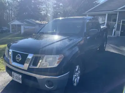 2009 Nissan Frontier 4x4, 4L. V6 auto. Comes with tonneau cover, 2” receiver and hitch, remote start...