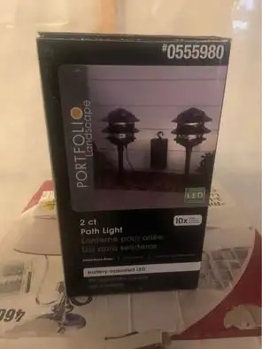 New path lights, black finish, battery-operated LED, 2 pack. Still in original packaging.