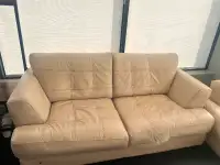 Leather love seat and sofa couch