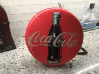 Coca- Cola collector working Phone