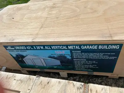 This is an unused 42' long x 26' wide metal garage building, providing approximately 1092 sq-ft of f...