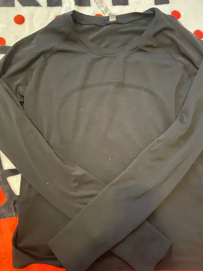 black lululemon long sleeved activewear top, View more