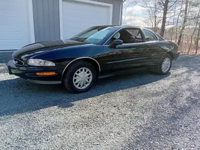 A stunning Modern Classic. 3800 Supercharged engine. Kept in pristine condition. Exceptional Ebony e...