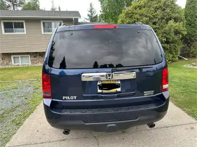 2013 Honda Pilot Touring model in excellent condition. Based in Prince George. 180,000 km.