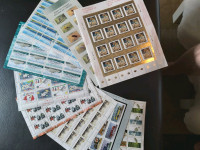 Mint ,  complete sheets of Canadian stamps,  $15 each 