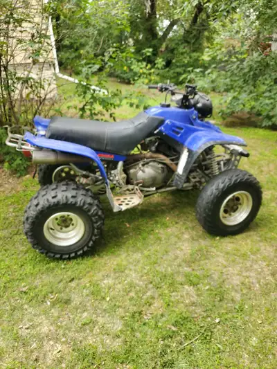 I am selling my 2001 Yamaha Warrior. Has new CDI box, magneto, and battery. Also come with sand tire...