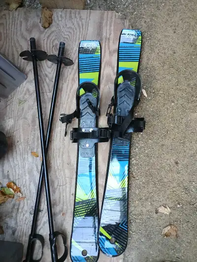 In very good condition as they where barley used 4+ Skis 69cm long Comes with poles No metal, safe f...