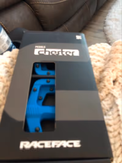 Race Face peddles for racing bike, still in box. also two pair of Race Face shorts, large and extra...