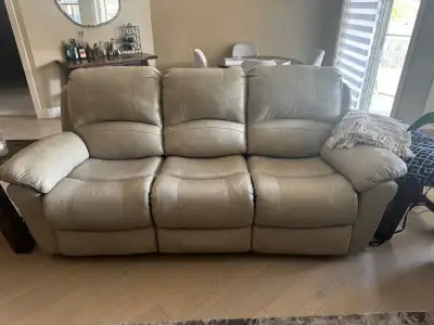 Set of 2 electric genuine leather reclining sofas (One is a loveseat) Color: Beige No stains No smok...