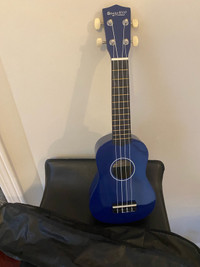 Strong wind wooden ukulele 21 “ tall.