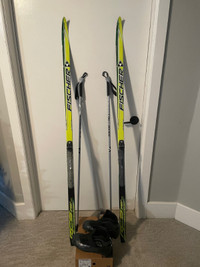 Traditional cross country skis, boots, bindings, and poles