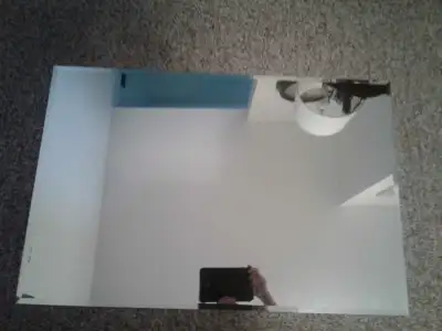24"×36",vanity mirror ,excellent condition, comes with hardware to hang.home depot 65$ plus tax