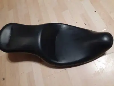 This is a used Harley-Davidson seat, part number 53026-98A, offering a classic look and comfortable...