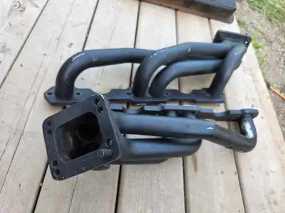 What i have here i believe there t4 twin turbo header or headers for a turb set up they cam on my mo...