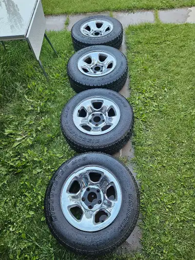 245/70R17 Cooper Discoverer winter tires on spoke chrome rims. Winter set. Great set balance ready t...