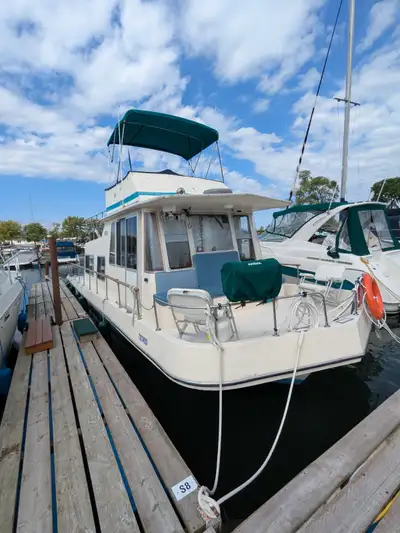 Two 165 Mercury L6 drive this beast. Original brochure says it will do 30 MPH. One engine completely...