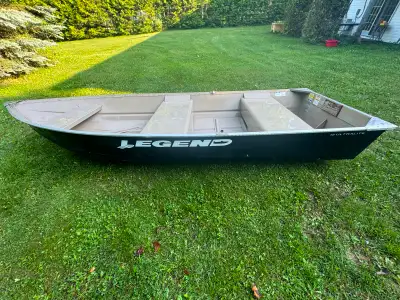 1) 2013 Ultralite 12 (foot) aluminum. Excellent condition. $2500 2) Runs great - 1977 Eska 5HP 2 str...