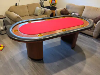 Solid table thats sits 8-10 players. Base legs can be taken off for transport