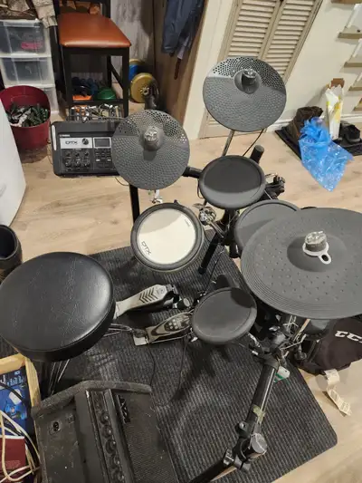 Yamaha electric drum kit with amp, View more