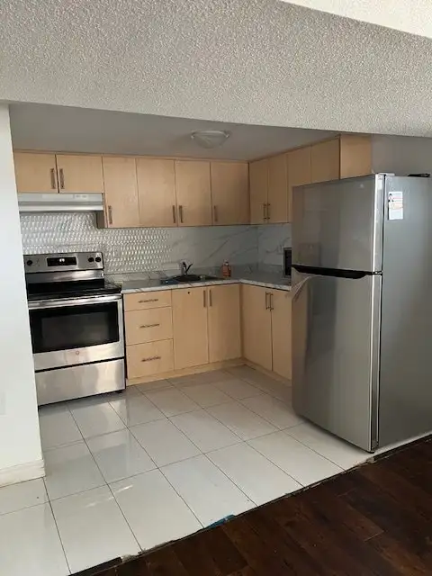 Spacious Legal 4-Bedroom Basement for Rent – Queen & McLaughlin