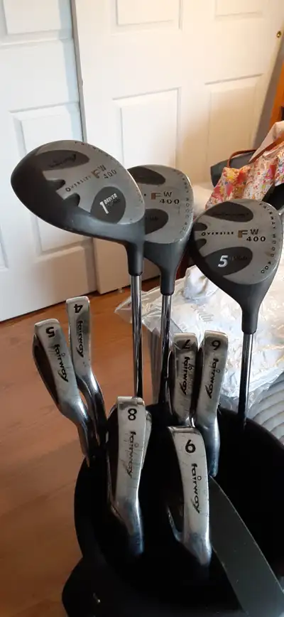 10 Pc set of Golf clubs (golf bag not included). Mens, right handed. They are in good shape, just no...