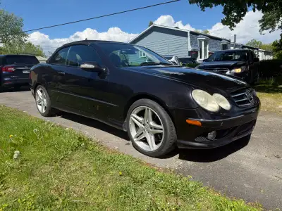I'm selling my elegant and high-performance black Mercedes-Benz CLK 500 convertible, perfect for enj...