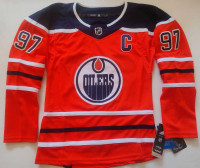 Women oilers orange jersey size S,M,L and XL.