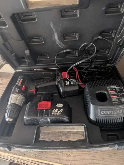Craftsman cordless drill with carrying case. Comes with 2 batteries and charger. 16.8V