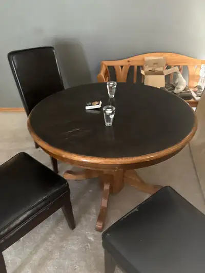 Oak I think Very sturdy Chairs are vinyl and a bit worn but well made Just need room why so cheap 41...