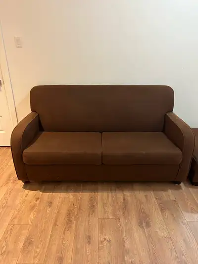 Custom made/ solid brown sofa bed. Great condition!