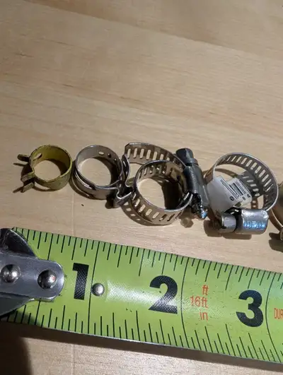 Here's a selection of used hose clamps, perfect for your automotive or plumbing needs. This collecti...