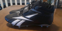 Brand new Reebok football cleats, size16