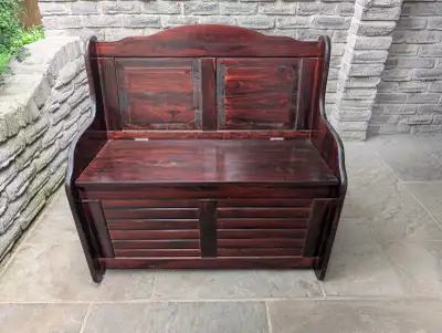 Solid wood front entrance way bench seat with lift seat for storage. Has some light wear on the fini...