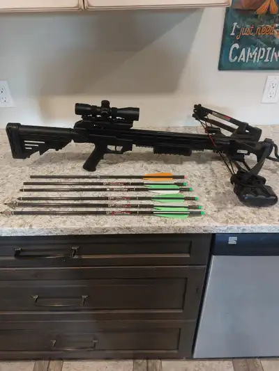Centerpoint crossbow sniper 370 like new, comes with 5 easton bolts, 2 have broadheads and 2 have fi...