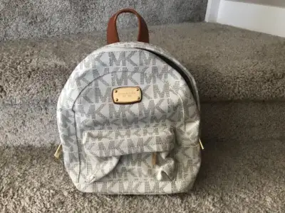 GENUINE LEATHER MICHAEL KORS BACKPACK AND WALLET, View more