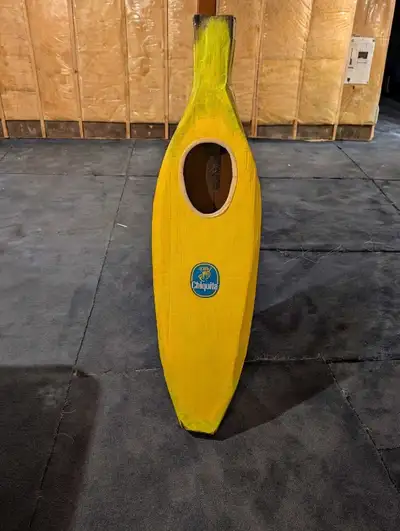 This is a banana costume for a child. It was made by me. I constructed it from card board and painte...