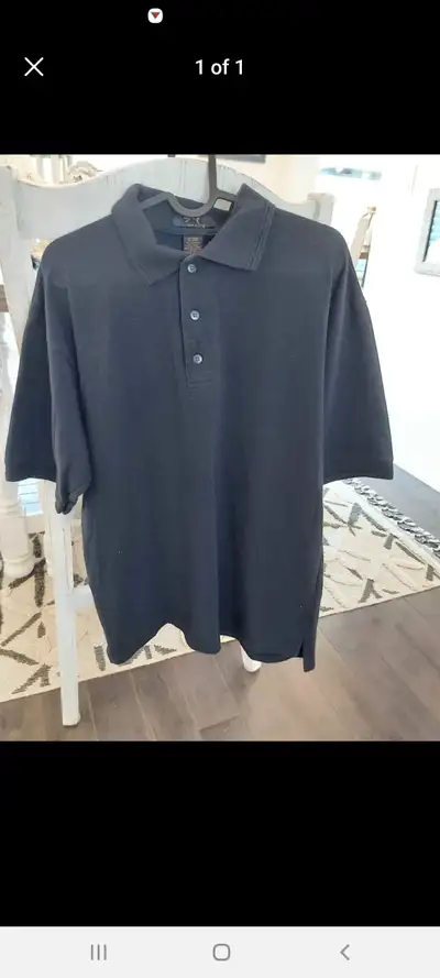 Mens ribbed golf shirt. Size medium. In good condition from a smoke free home. Ribbed material