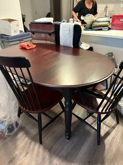 Solid wood, cherry and black with distress accent table in mint condition no scrapes, no dents Or st...