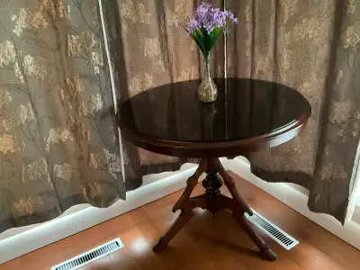 Ornate round pedestal table, View more