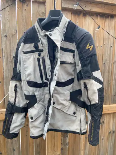 This is a Scorpion motorcycle jacket designed for optimum rider protection. It is a large size and m...