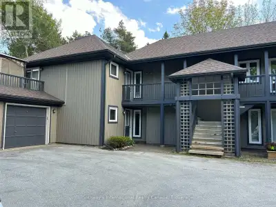 Stunning ground floor 2 bdrm. garden home w/garage in amenity rich Lighthouse Pt. This waterfront de...