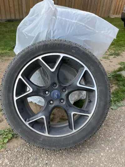 Four tires and rims for Ford Focus 215/50/R17