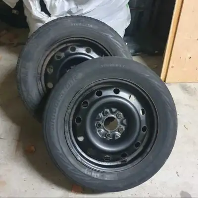 Selling 16" steel rims with tires. Tires will need to be replaced, 2 are bald and 2 are "okay" for s...