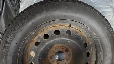 No longer have car, so selling steel wheel and tire set. The thread depth is 5-6/32 so should be goo...